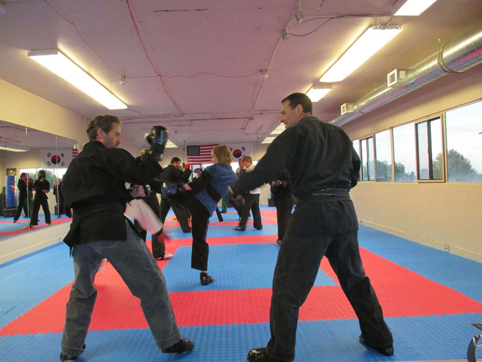 Adult black belts sparring